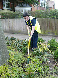 employee working in grounds maintenance